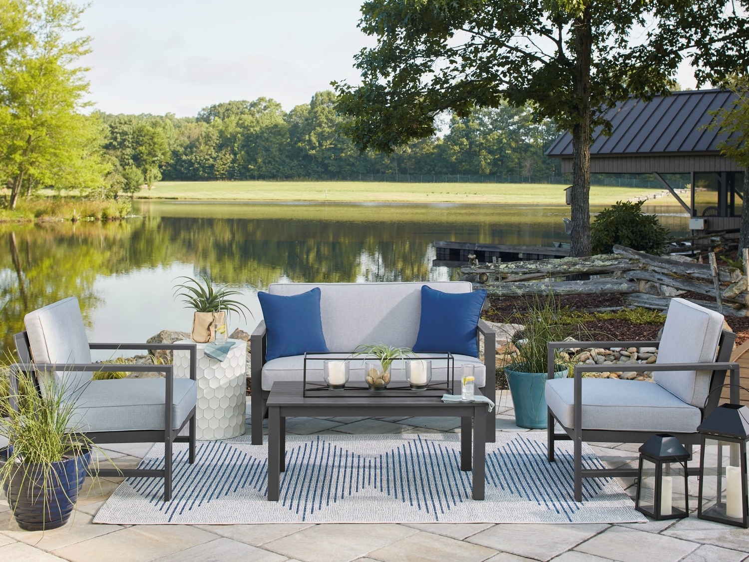 Fynnegan Outdoor Loveseat and 2 Chairs with Coffee Table