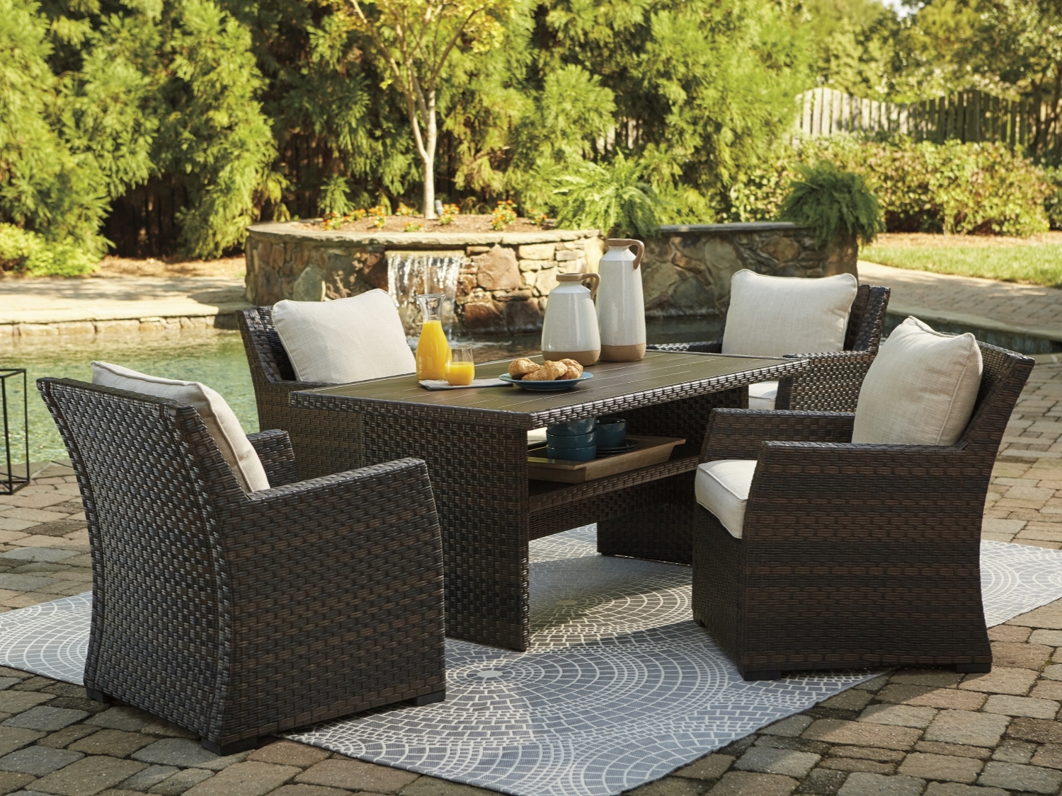 Easy Isle Outdoor Dining Table and 4 Chairs by Ashley