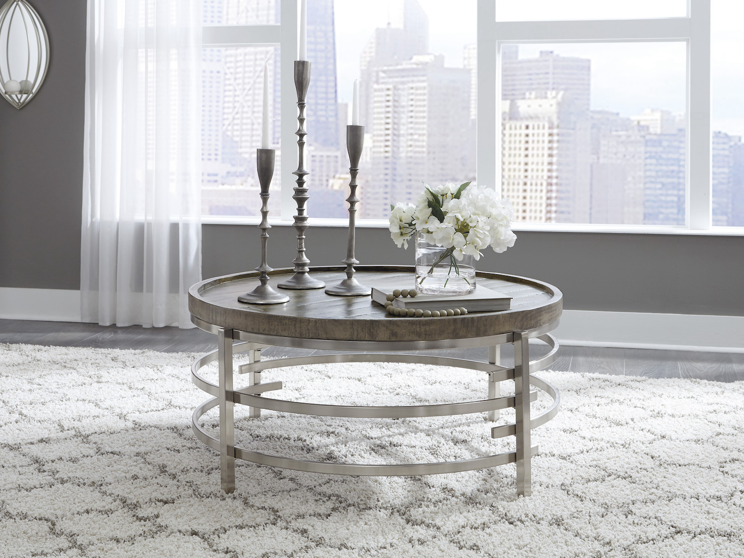 Signature design by Ashley steel base Zinelli Round Coffee Table in Grey
